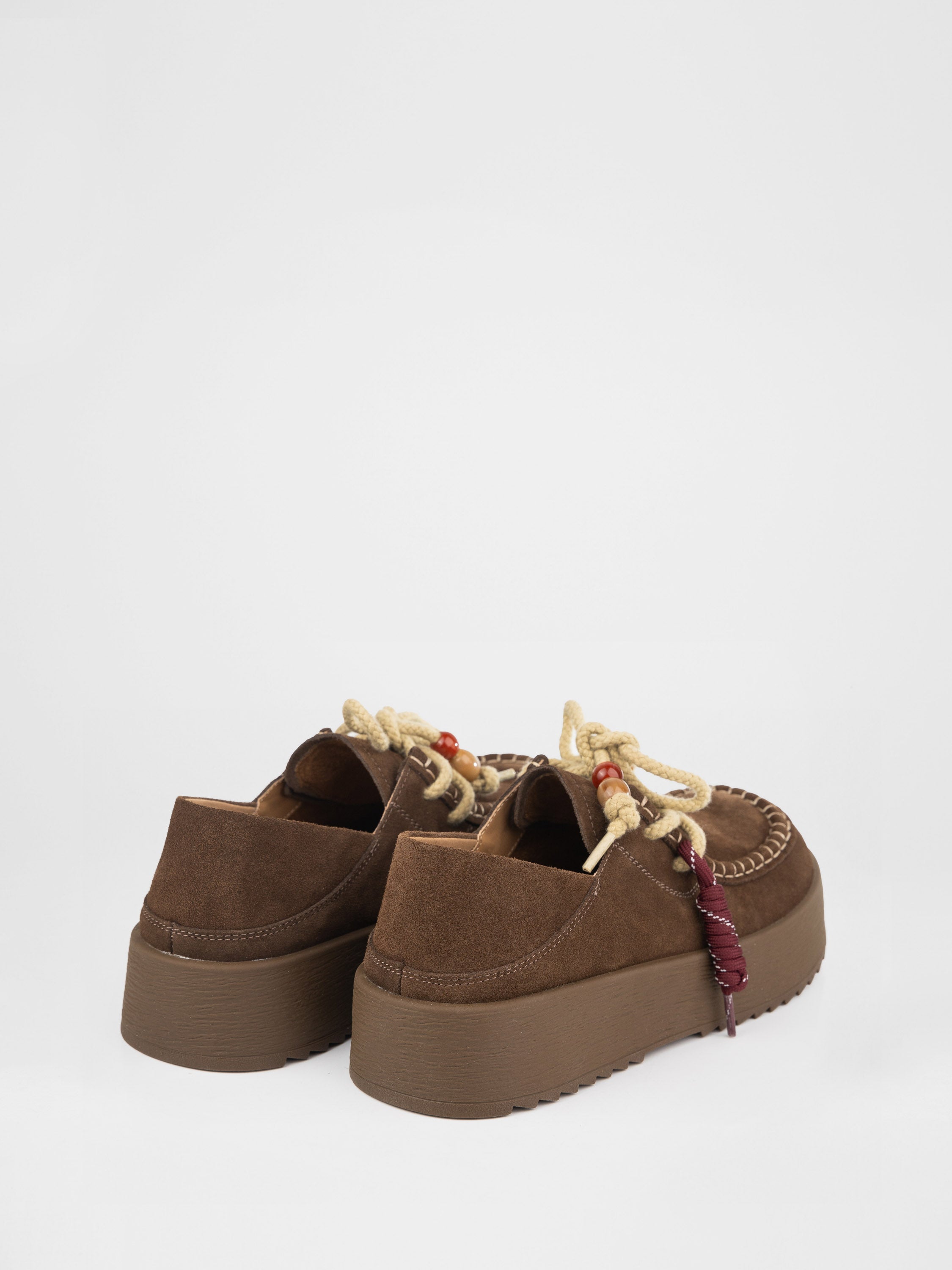 Лофери у коричневому кольорі на масивній підошві