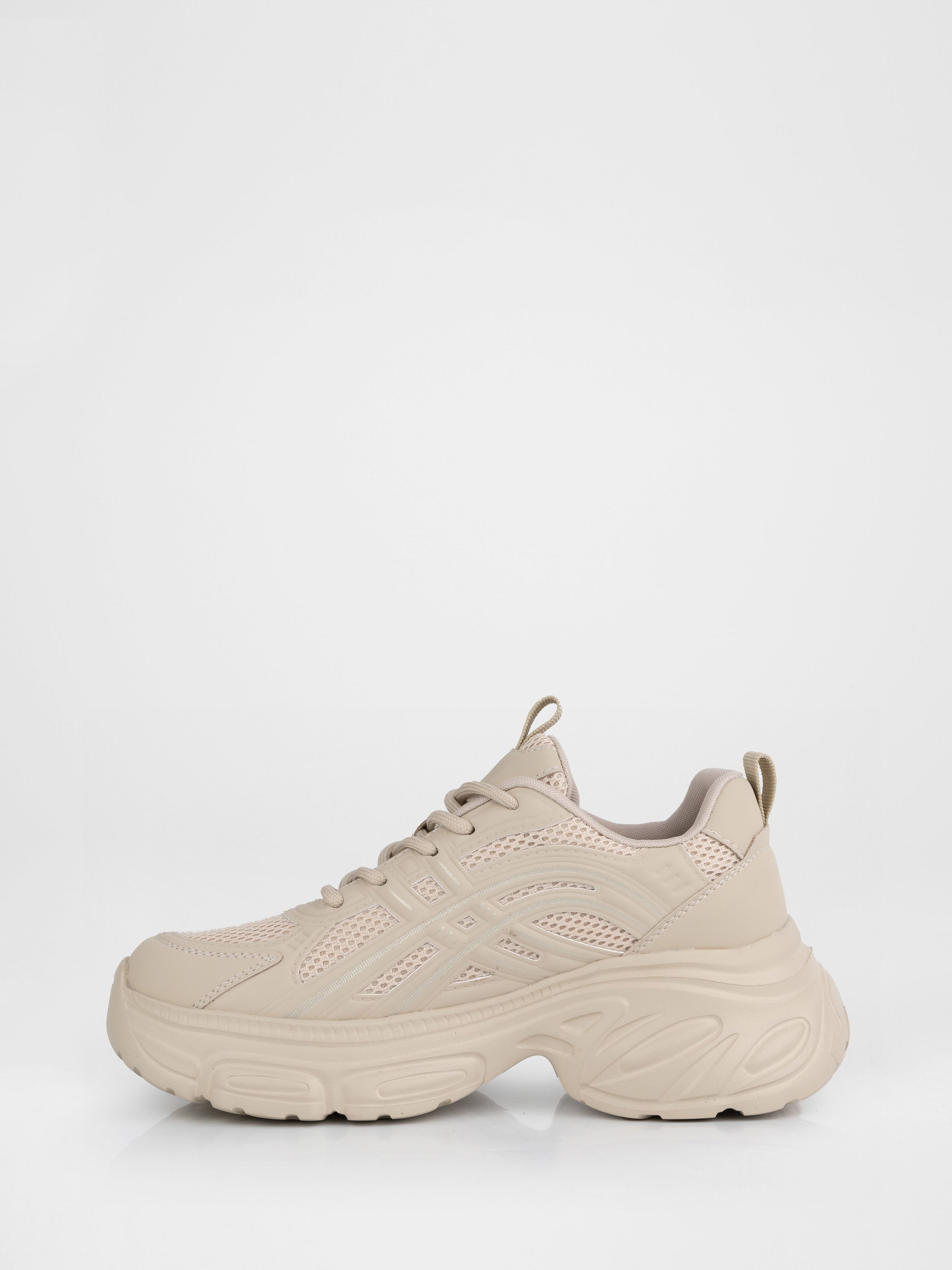 Бежеві кросівки на масивній підошві