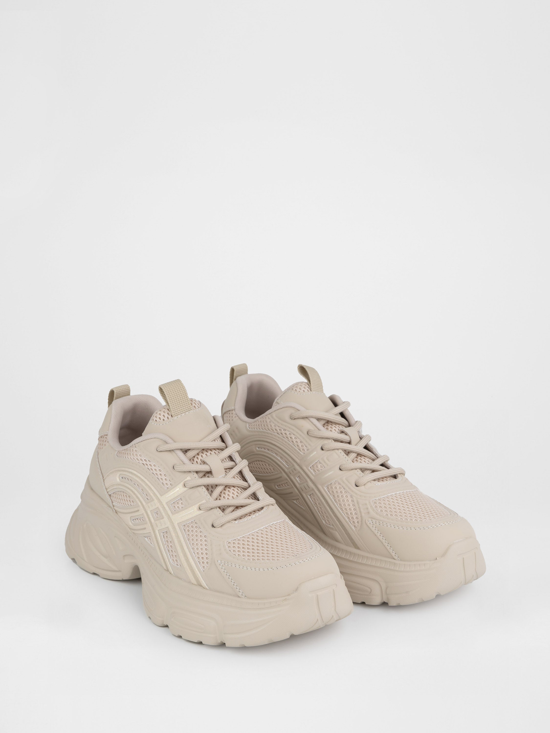 Бежеві кросівки на масивній підошві