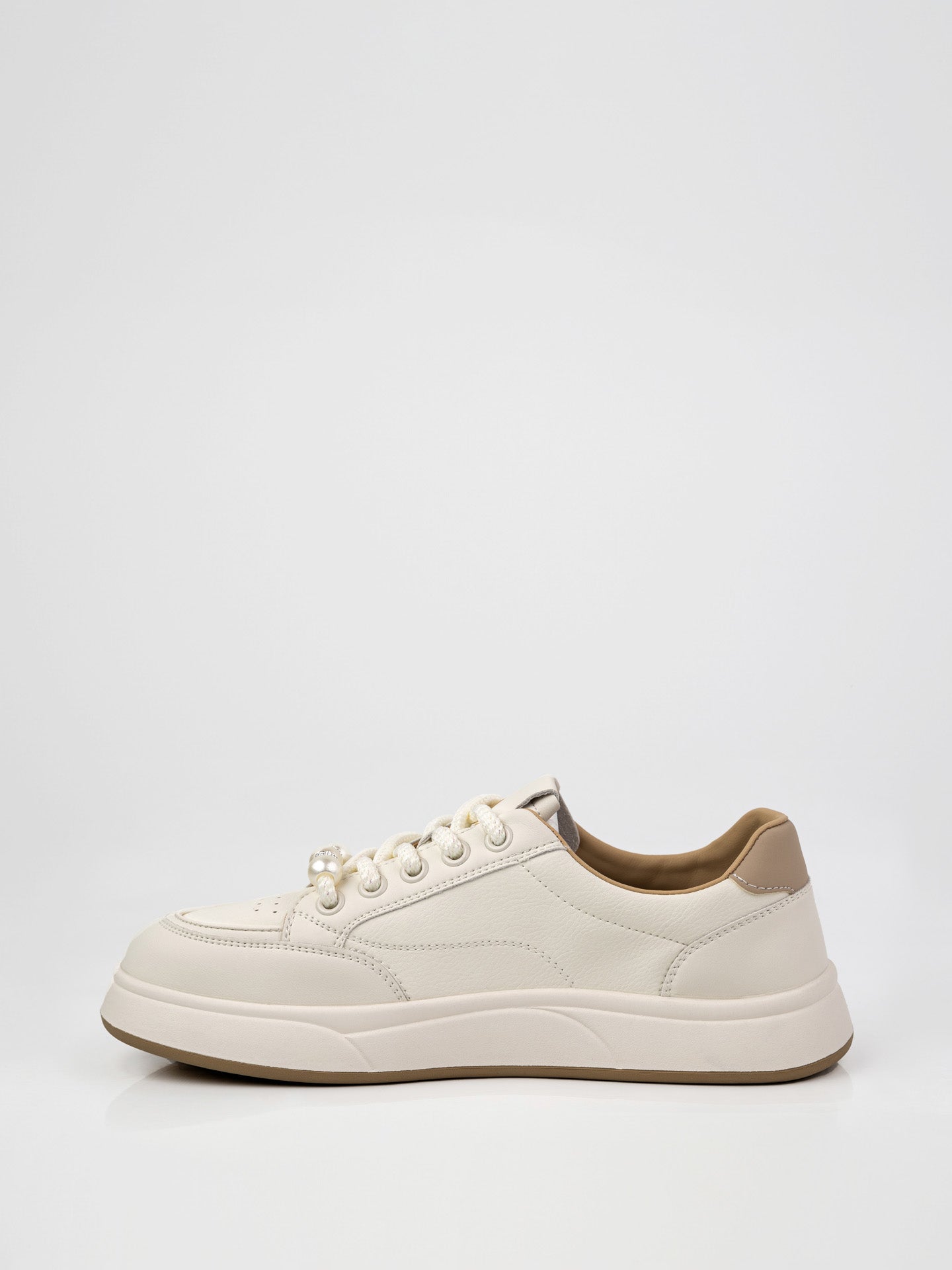 Кеди у бежевому кольорі