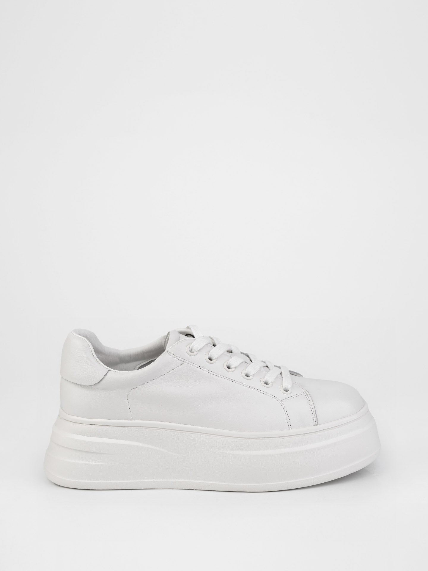 Кеди у білому кольорі на високій підошві