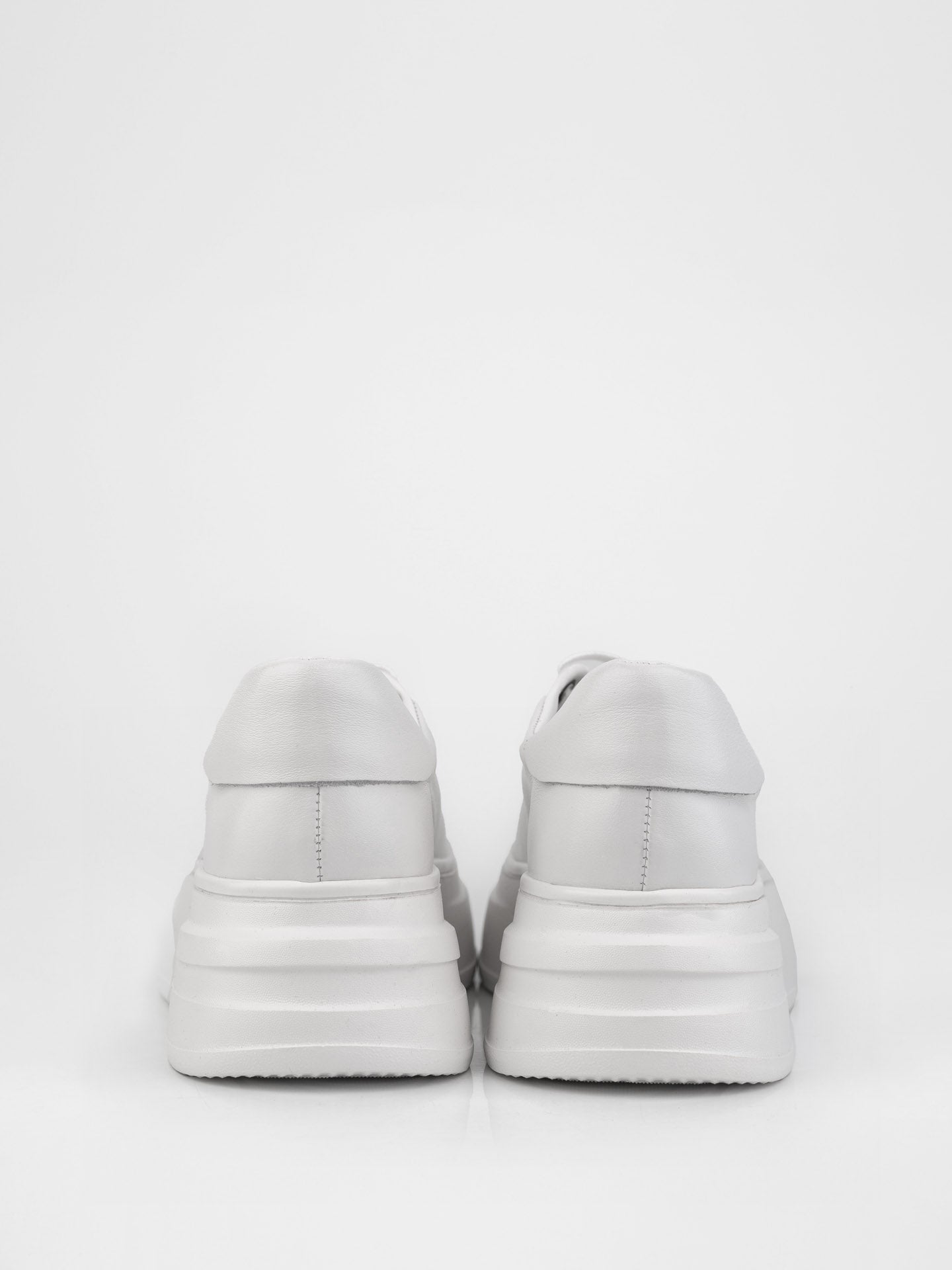 Кеди у білому кольорі на високій підошві