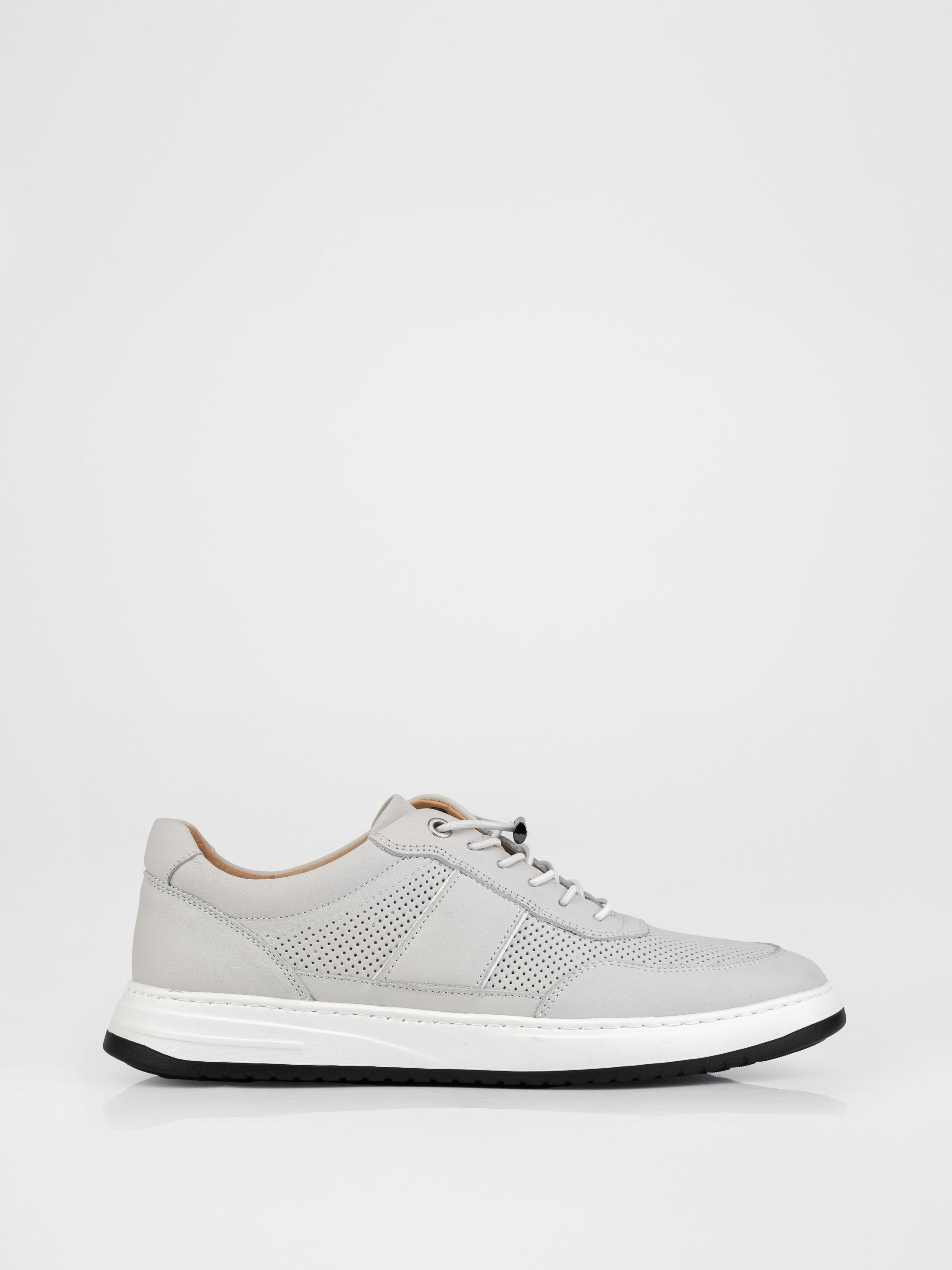 Кеди у білому кольорі з перфорацією