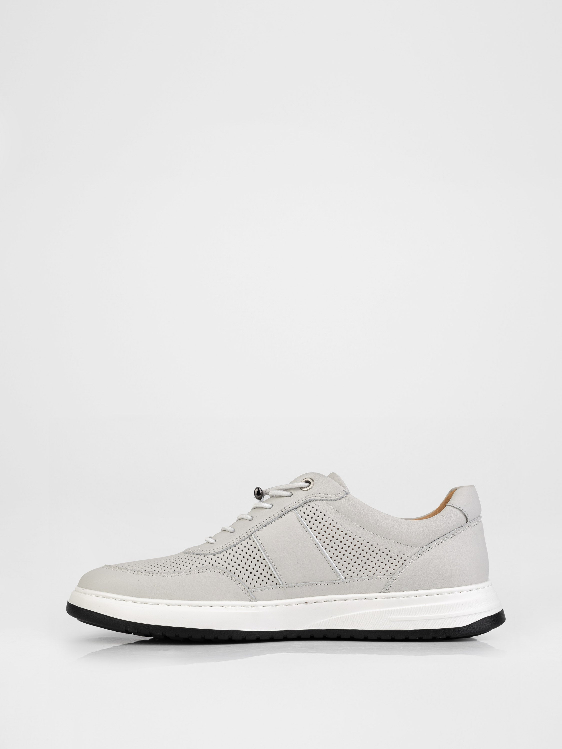 Кеди у білому кольорі з перфорацією