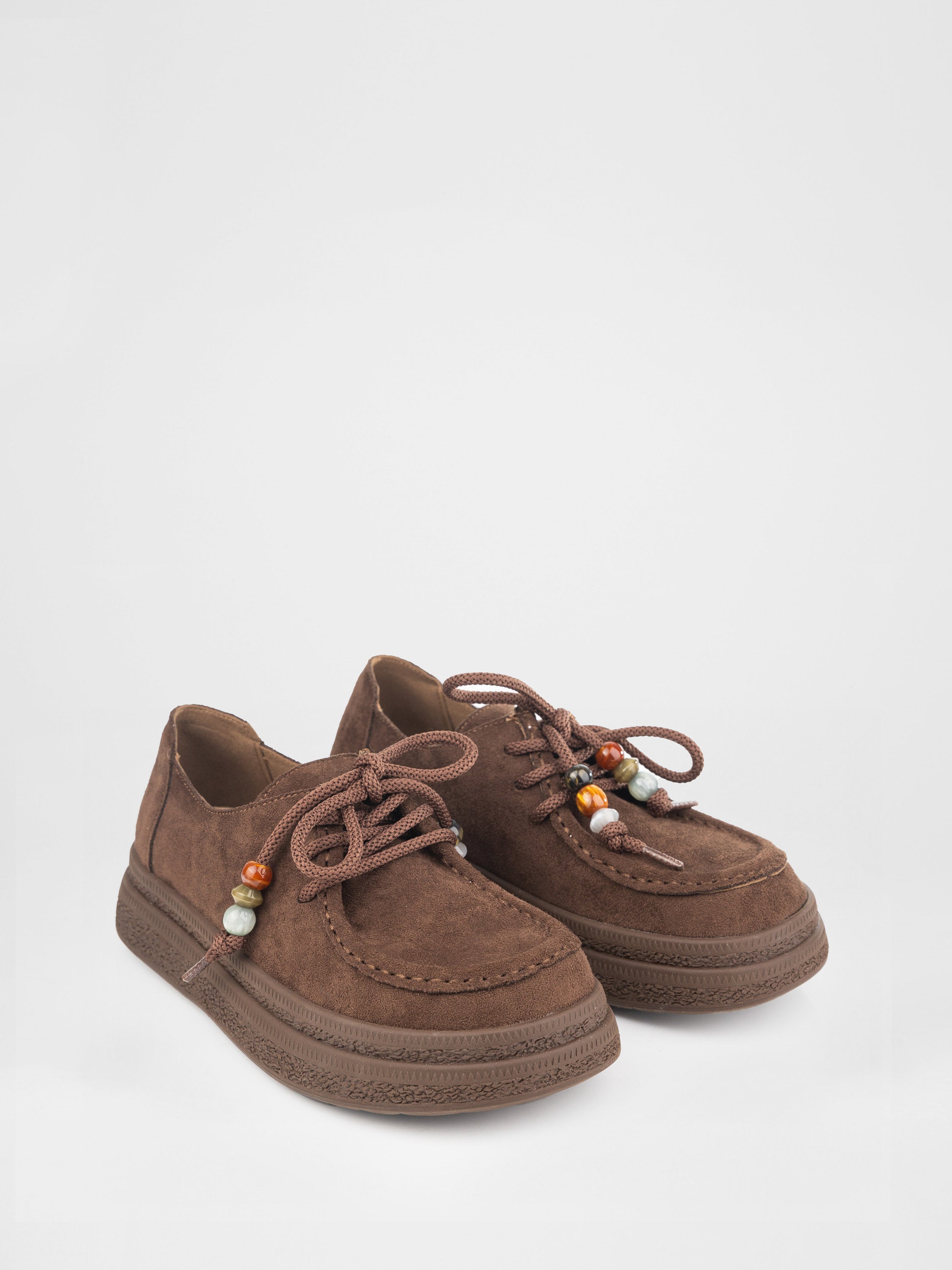 Лофери у коричневому кольорі з декоративними прикрасами