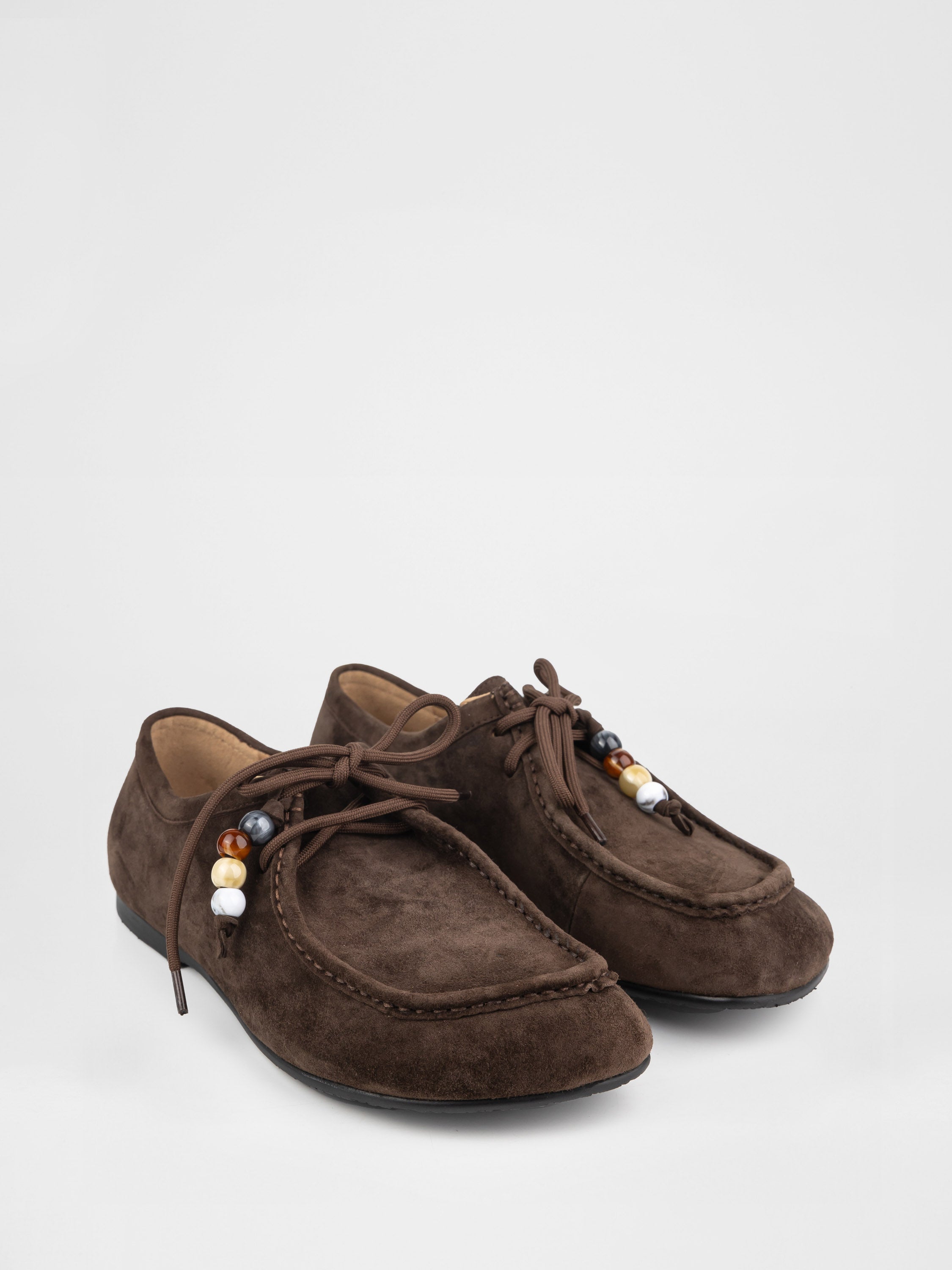 Лофери у коричневому кольорі з декоративними прикрасами