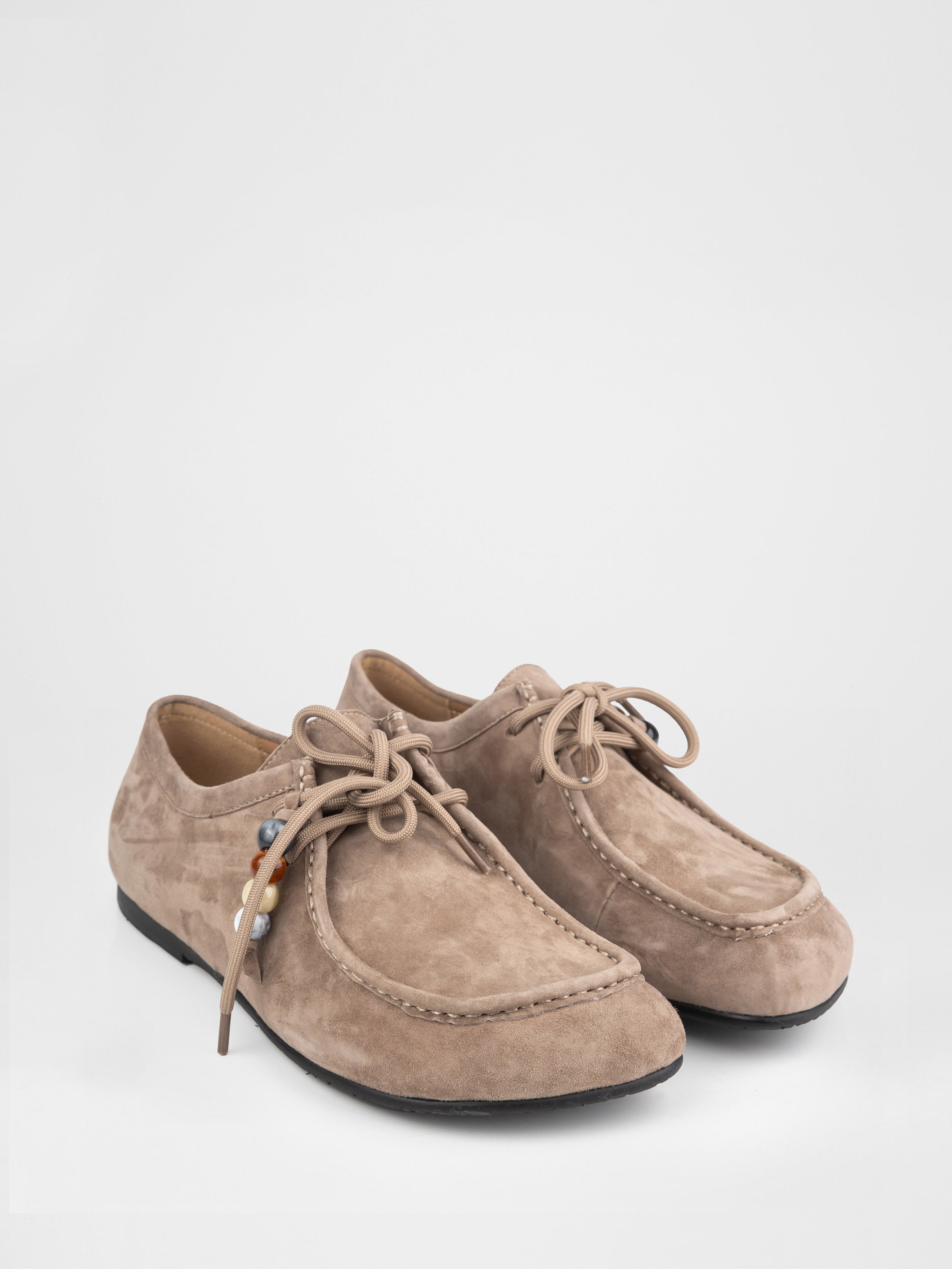 Лофери у бежевому кольорі з декоративними прикрасами