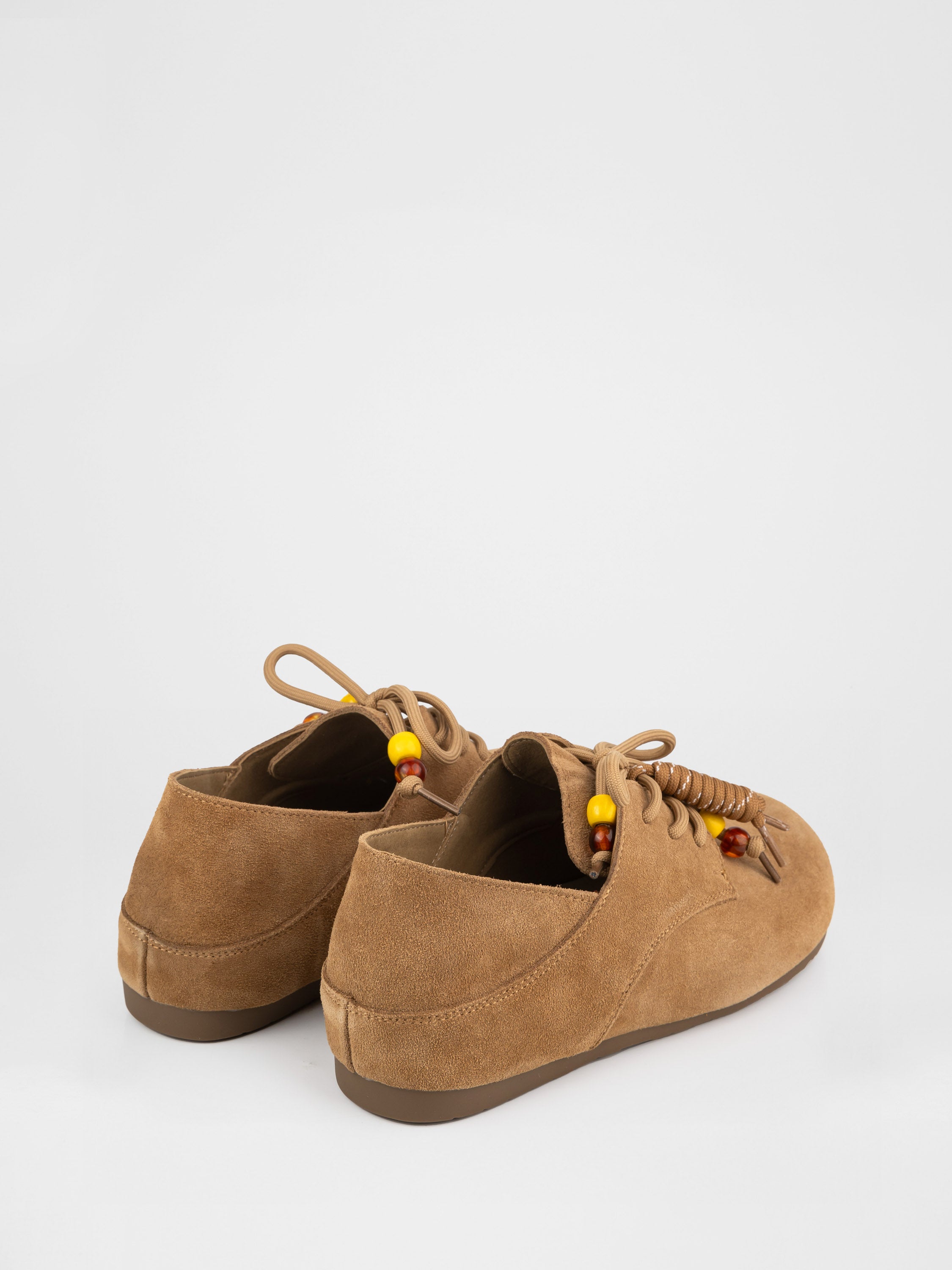 Замшеві лофери у бежевому кольорі